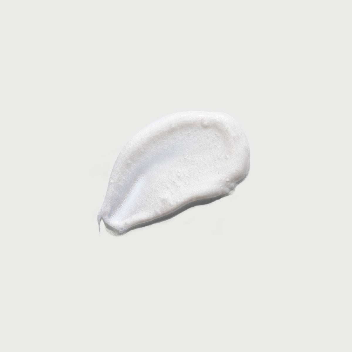 the-smoother-glycolic-acid-exfoliating-body-wash-u7 NATR-40002-Swatch-The-Smoother-Glycolic-Acid-Exfoliating-Body-Wash-bonebkgd.jpg