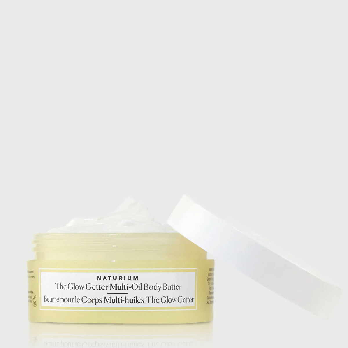 the-glow-getter-multi-oil-body-butter-travel-size-f7 NATR-40115_Glow-Getter-Body-Butter-Mini_front_capoff_bonebkgd.webp