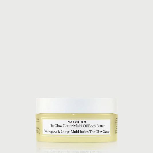 the-glow-getter-multi-oil-body-butter-travel-size-f7 NATR-40115_Glow-Getter-Body-Butter-Mini_front_capon_bonebkgd.webp